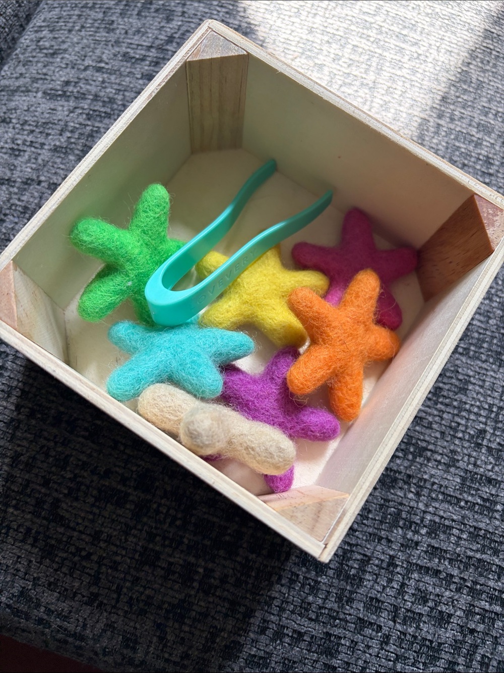 Lovevery felt stars and tweezers
